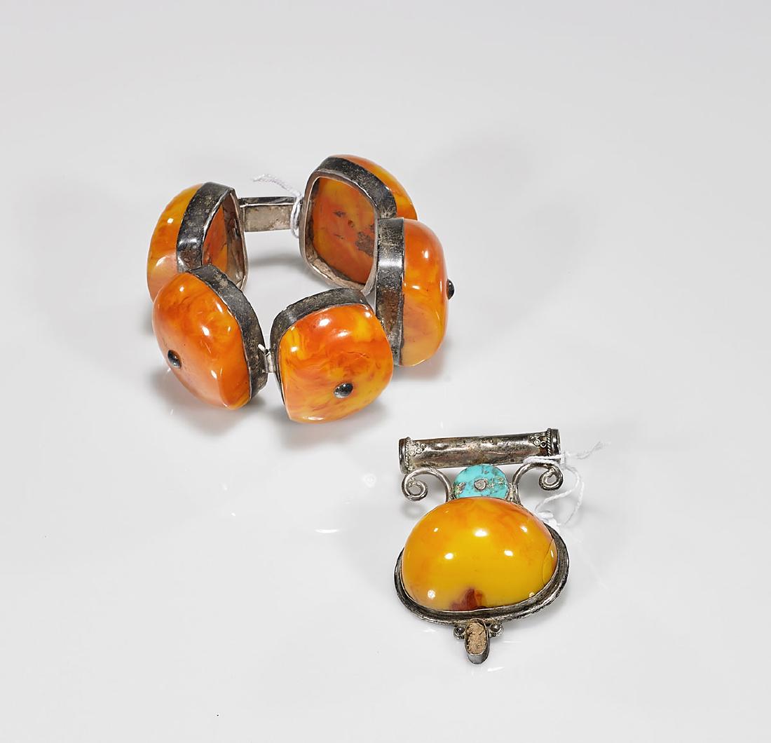 Sterling Silver & Amber-Like Cabochon Jewelry Suite:: Sterling silver and Amber-like cabochon jewelry suite: bracelet and pendant; each mounted to sterling, stamped 925 to pendant; Provenance: Estate of Randy Melson; L: 8" (longest, approx.)