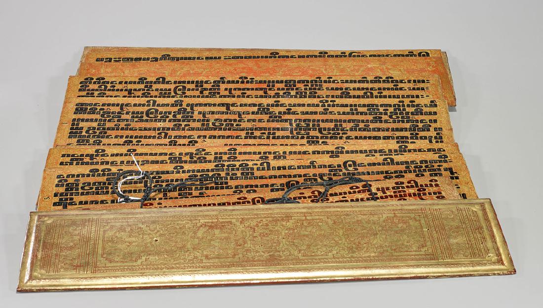 Gilt Buddhist Scripture Book: Gilt Buddhist scripture book; comprising 20 panels; Provenance: Collection of John B. Wickman; L: 24 1/2" (approx.)