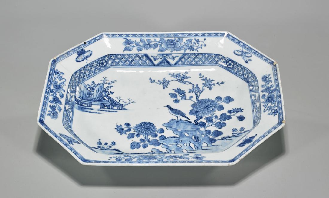 Chinese Blue & White Export Porcelain Dish: Chinese blue and white export porcelain dish; centering a bird atop rockery amid flora; Provenance: Collection of John B. Wickman; L: 15" (approx.)