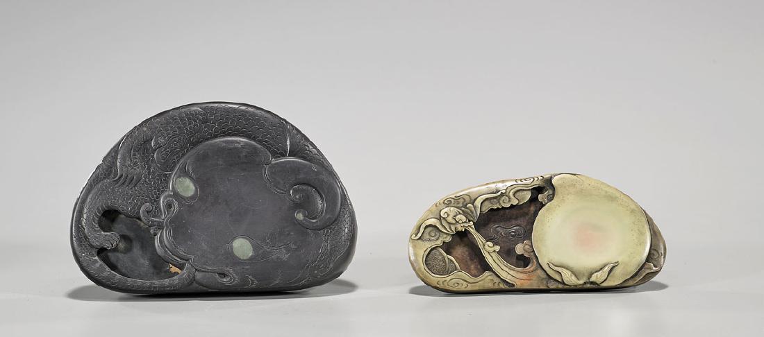 Two Chinese Inkstones: Two Chinese inkstones: one showing design of bat and peach; together with larger featuring a mythical animal, inscriptions to base; L: 6 1/4" (longest, approx.)
