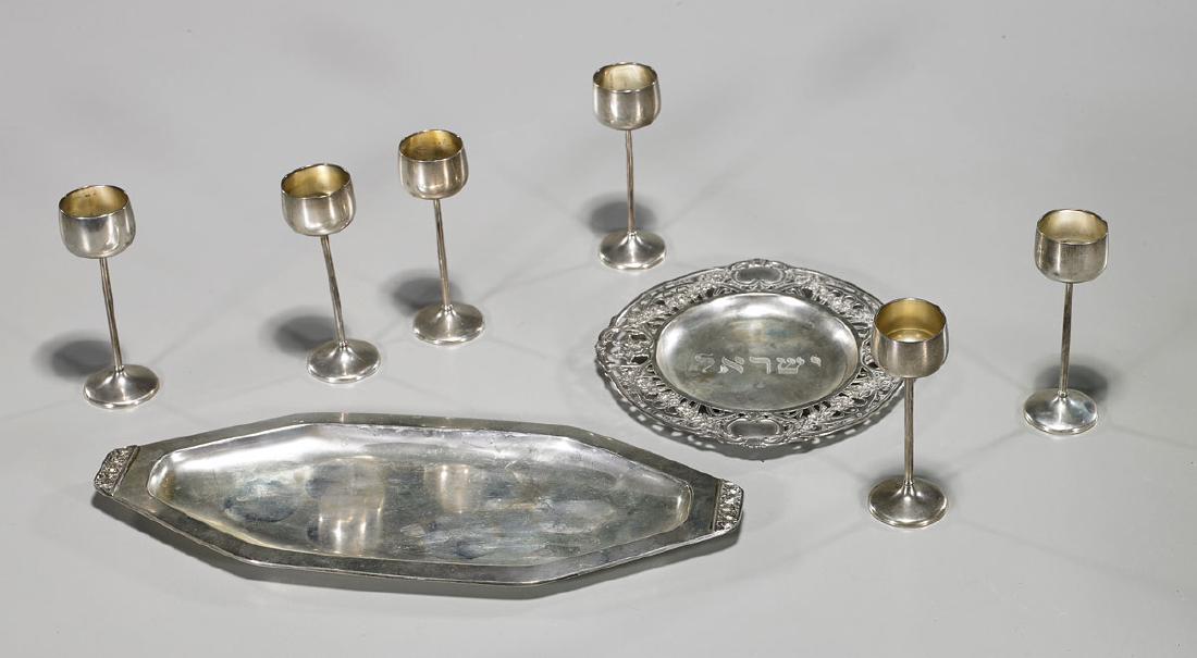 Group of Eight Silver Pieces: Group of eight silver pieces: six cups; together with two plates; each stamped 800; weighing approx. 14 troy oz.; L: 11 1/4" (longest, approx.)