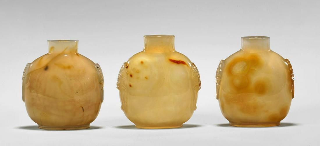 THREE FINELY HOLLOWED ANTIQUE HONEY AGATE SNUFF BOTTLES (1 of 3)