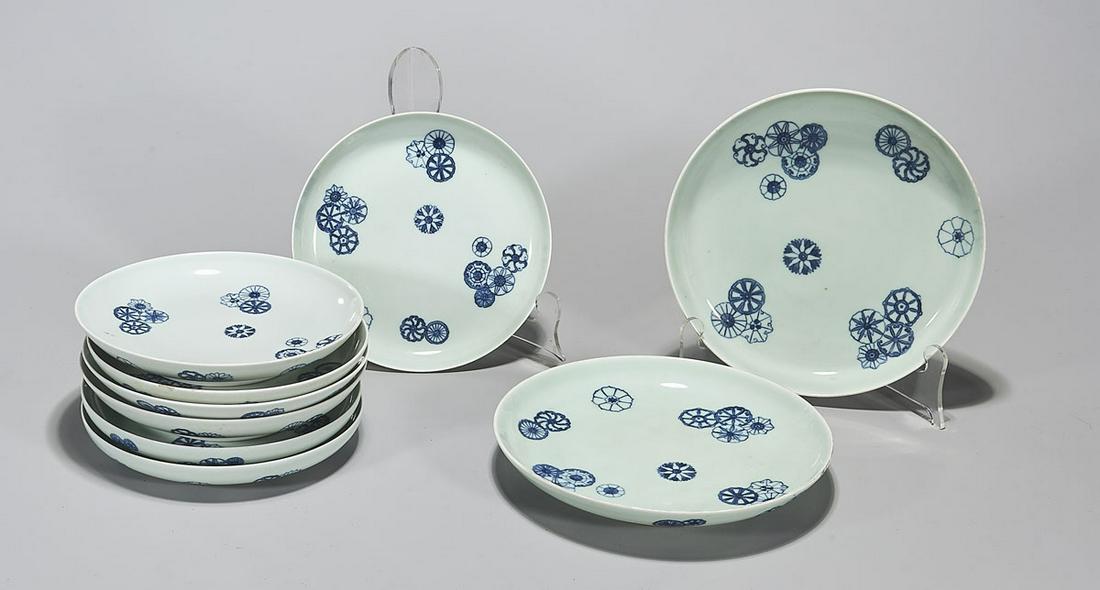 Set of Qianlong-Style Porcelain Plates: Set of nine Chinese Qianlong-style porcelain plates; with underglaze blue floral decoration on a pale blue ground; each with mark to base; D: 8 1/2" (larger size)