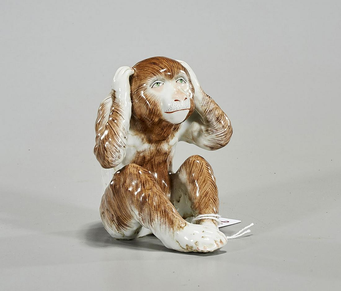 Cartier Porcelain Monkey: Cartier porcelain monkey; signed to base; H: 4 1/2" (approx.)