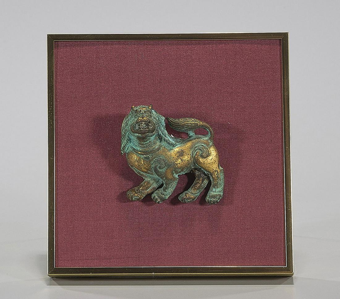 Small Tibetan Gilt Copper Lion (1 of 2)