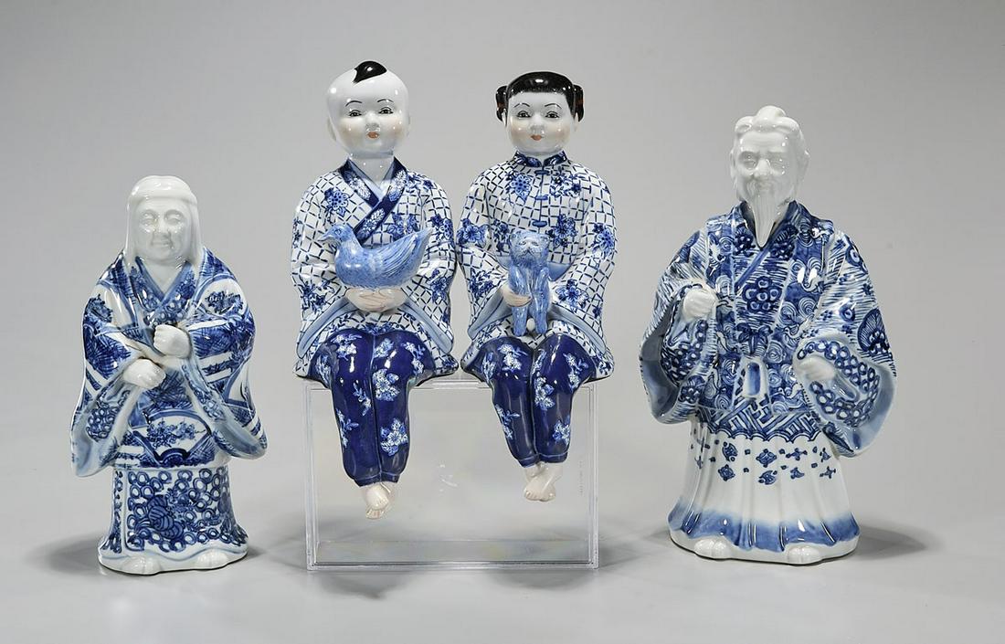 Group of Four Asian Blue and White Porcelain Figures (1 of 3)