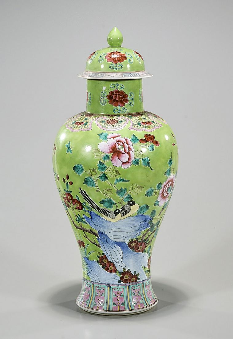 Chinese Enameled Porcelain Covered Vase: Chinese covered green ground vase depicting birds, flowers and water; Guangxu mark but later; 17" x 7 1/2" (approx.) Condition: minor chips, general wear, pits, frits