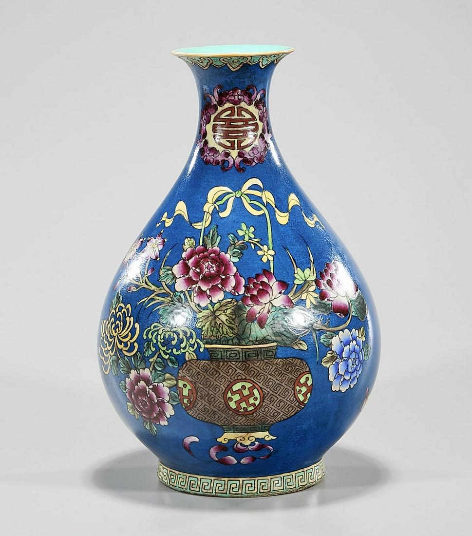 Chinese Enameled Porcelain Yuhuchun Vase: Chinese enameled porcelain Yuhuchun vase with flower motif; Qianlong mark but later; 12 1/2" x 8 1/2" (approx.) Condition: general wear, frits, pits