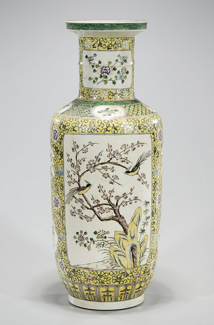 Chinese Enameled Porcelain Vase: Chinese enameled porcelain vase; yellow ground with flower and bird motif; 20" x 8 1/2" Condition: general wear, frits, pits