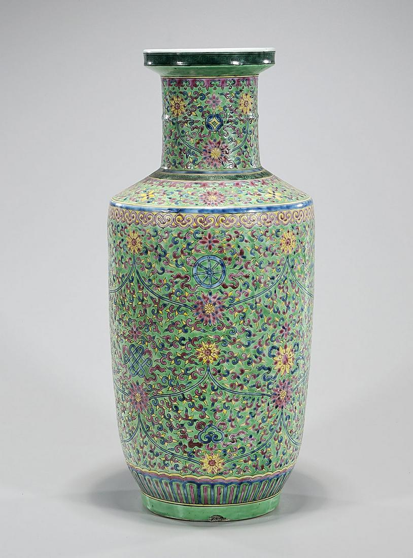Chinese Enamel Porcelain Vase: Chinese porcelain vase with all-over scrolling floral design; Kangxi mark but later; 18" x 8" (approx.) Condition: minor chips, general wear, frits, pits