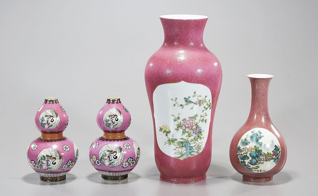 Group of Four Chinese Peach Glazed Vases: Four Chinese porcelain vases, including pair of gourd-form; landscape, birds and crane motifs; 14" x 7" (largest, approx.) Condition: general wear, frits, pits