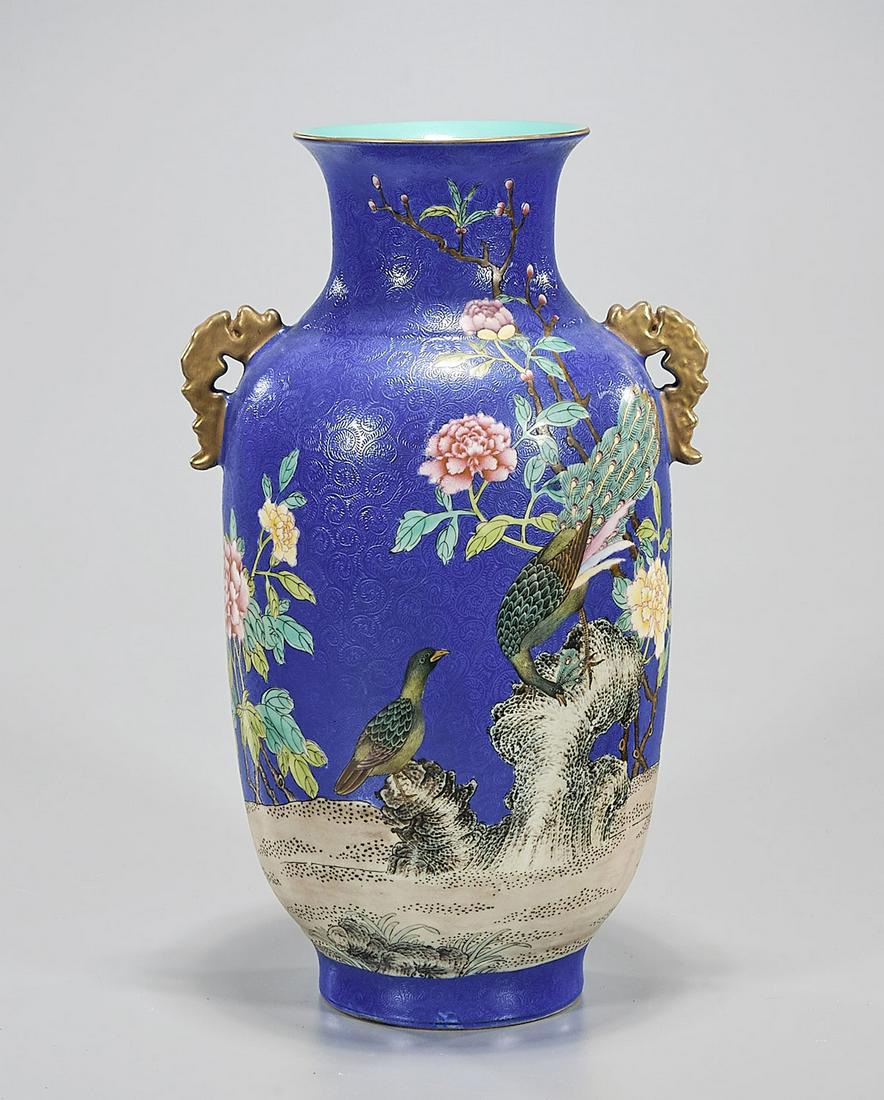 Chinese Blue Glazed Porcelain Vase: Chinese blue porcelain vase depicting birds and flowers; animal handles; Qianlong mark but later; 14" x 9" (approx.) Condition: general wear, frits, pits