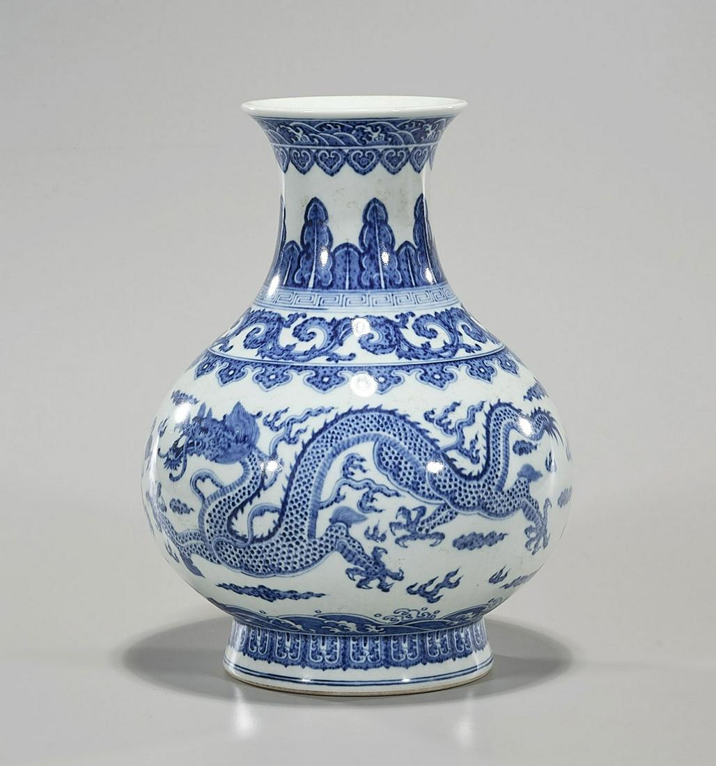 Chinese Blue and White Porcelain Vase: Chinese blue & white porcelain vase; dragon chasing flaming pearls; Qing-style with yongzheng mark, but later; H: 11 1/2" (approx.) Condition: general wear, frits, pits