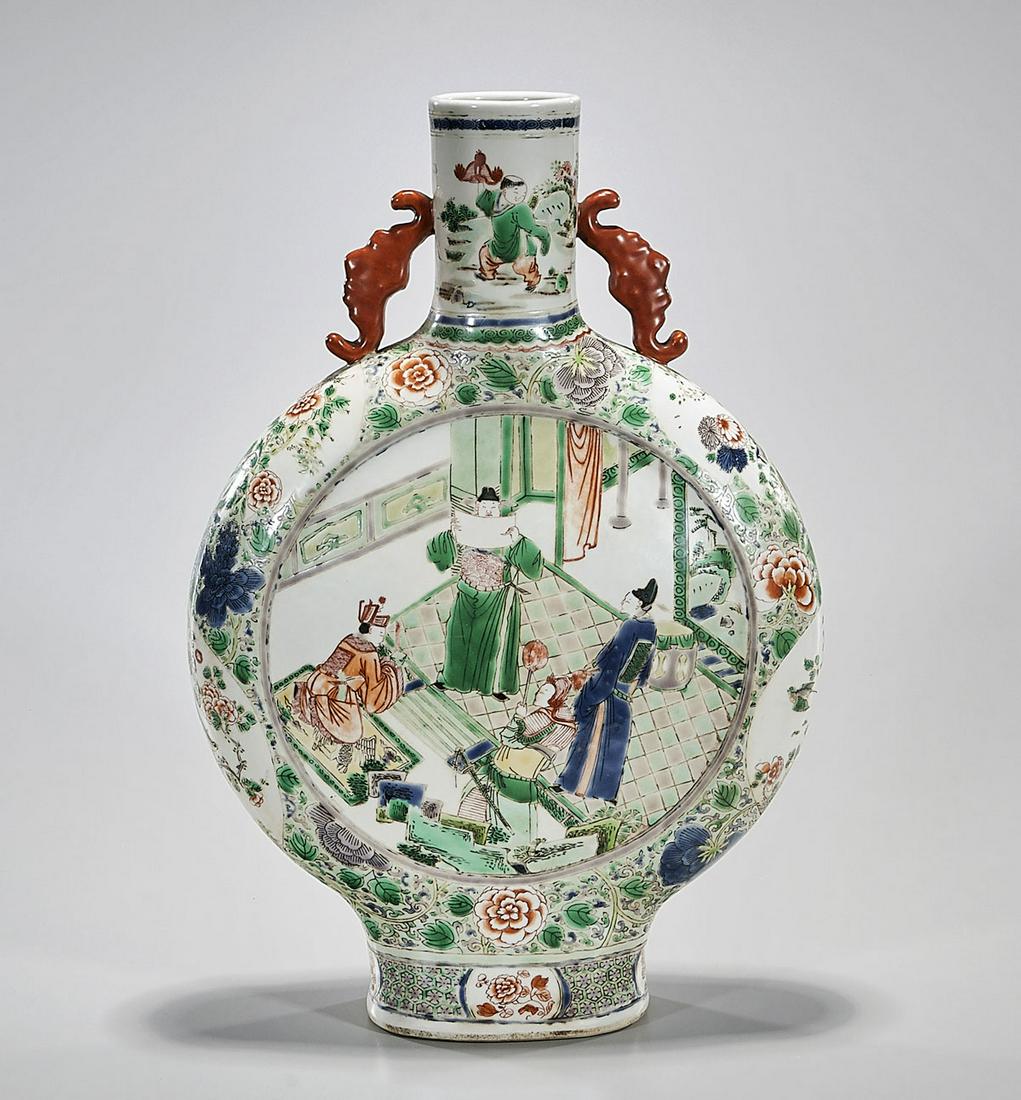 Chinese Wucai Porcelain Moonflask: Chinese Wucai porcelain moonflask vase with floral and figural motifs; Kangxi mark but later; 17 1/2" x 12" x 3 1/2" (approx.) Condition: general wear, frits, pits, minor losses