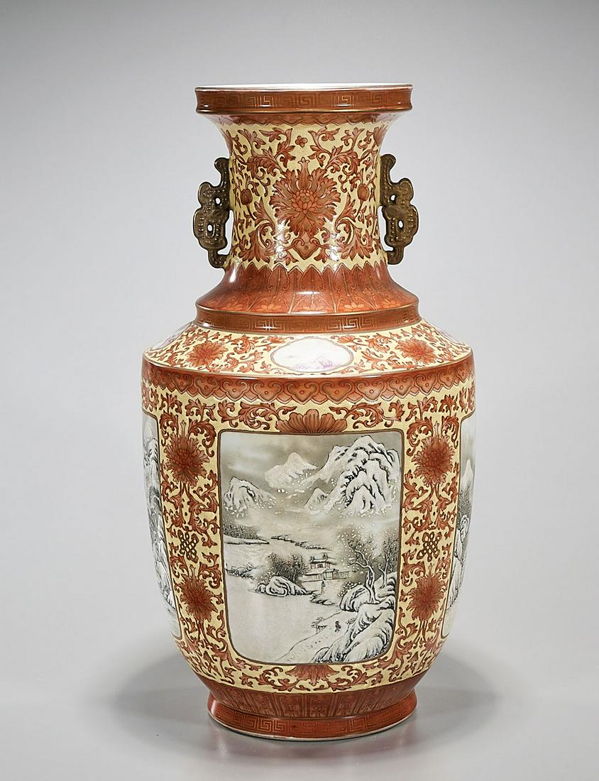 Chinese Enameled Porcelain Vase: Chinese enameled porcelain vase; red and yellow with paneled snowscape scenes; Yongzheng mark but later; 20" x 11" (approx.) Condition: general wear, frits, pits, minor losses