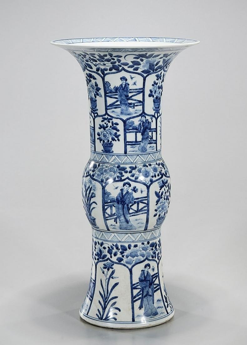 Chinese Blue and White Porcelain Vase: Chinese blue and white porcelain vase with figure and floral motifs; 16" x 8 1/2" (approx.) Condition: general wear, frits, pits, minor losses