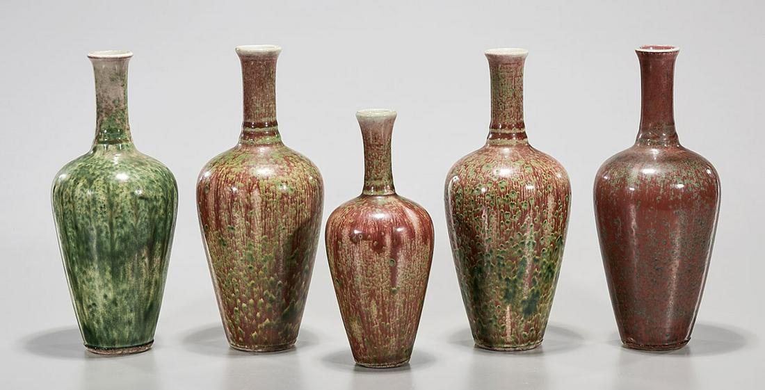 Group of Five Chinese Peach Blossom Glazed Porcelain: Five Chinese peach blossom glazed vases; 10 1/4" x 4 1/4" (largest, approx.) Condition: general wear, frits, pits, minor losses