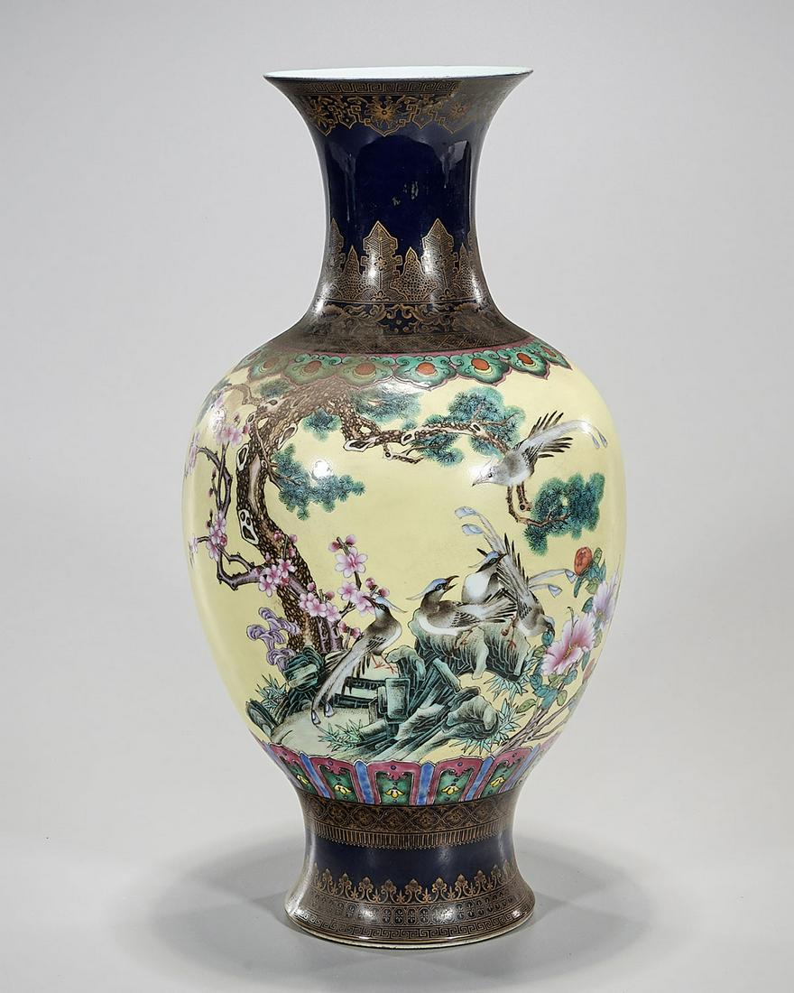 Chinese Enameled Porcelain Vase: Chinese enameled porcelain vase; central yellow ground with tree with birds motif; mark to base; 18" x 9" Condition: general wear, frits, pits, minor chips