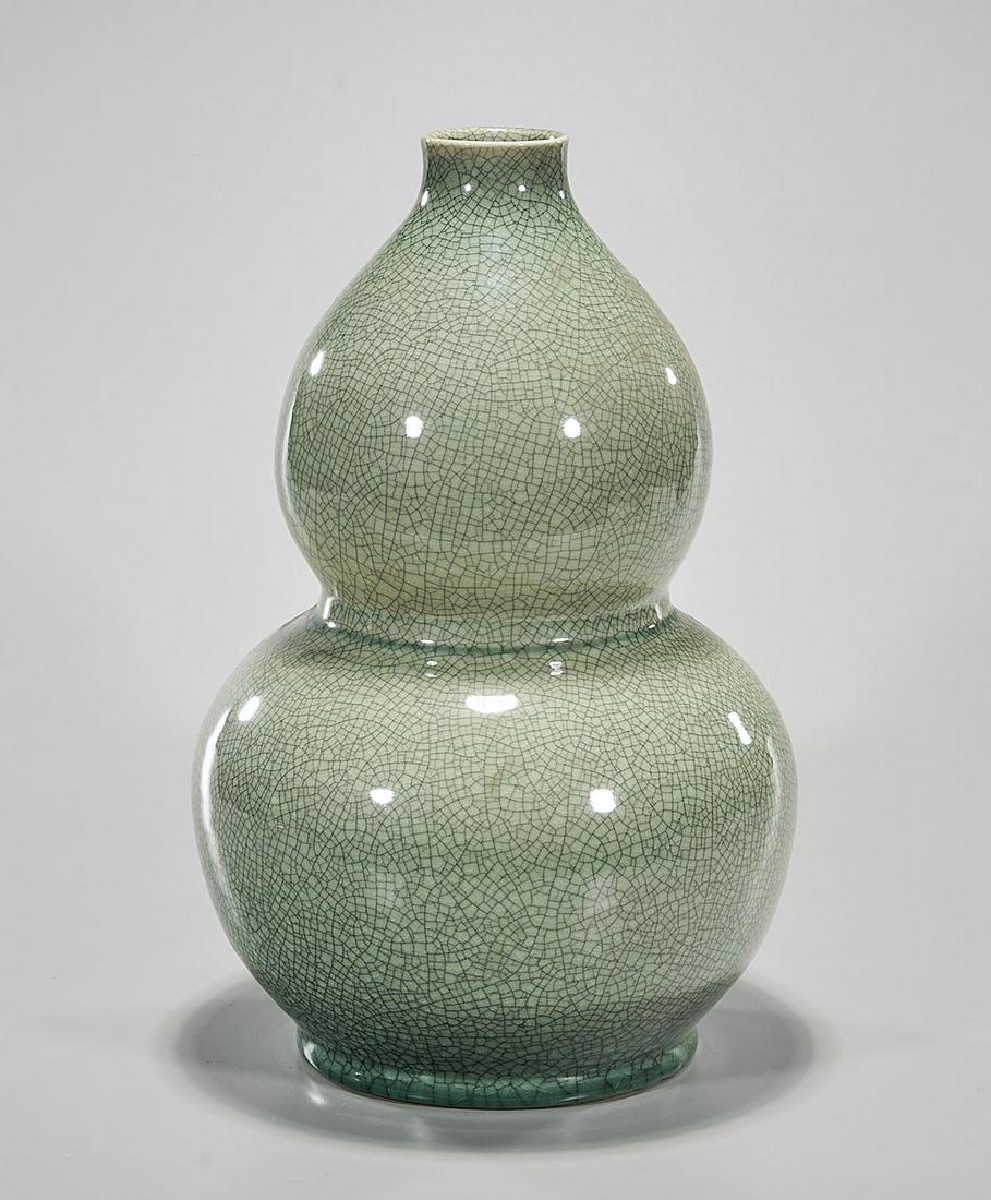 Chinese Green Crackle Glazed Porcelain Gourd Vase: Chinese crackle glazed green porcelain gourd vase; 15 1/2" x 9" (approx.) Condition: general wear, frits, pits, minor chips