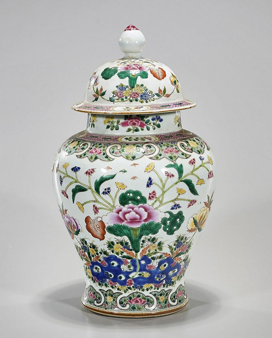 Chinese Enameled Porcelain Covered Vase: Chinese enameled porcelain covered vase with floral design; 15" x 8" (approx.) Condition: general wear, frits, pits, minor chips