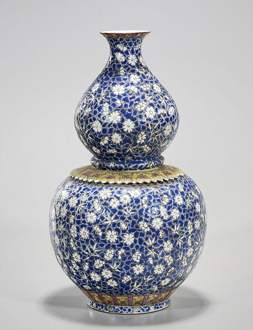 Chinese Enameled Porcelain Gourd Vase: Chinese enameled porcelain gourd vase; all-over floral design; 14" x 7" (approx.) Condition: general wear, frits, pits, minor losses