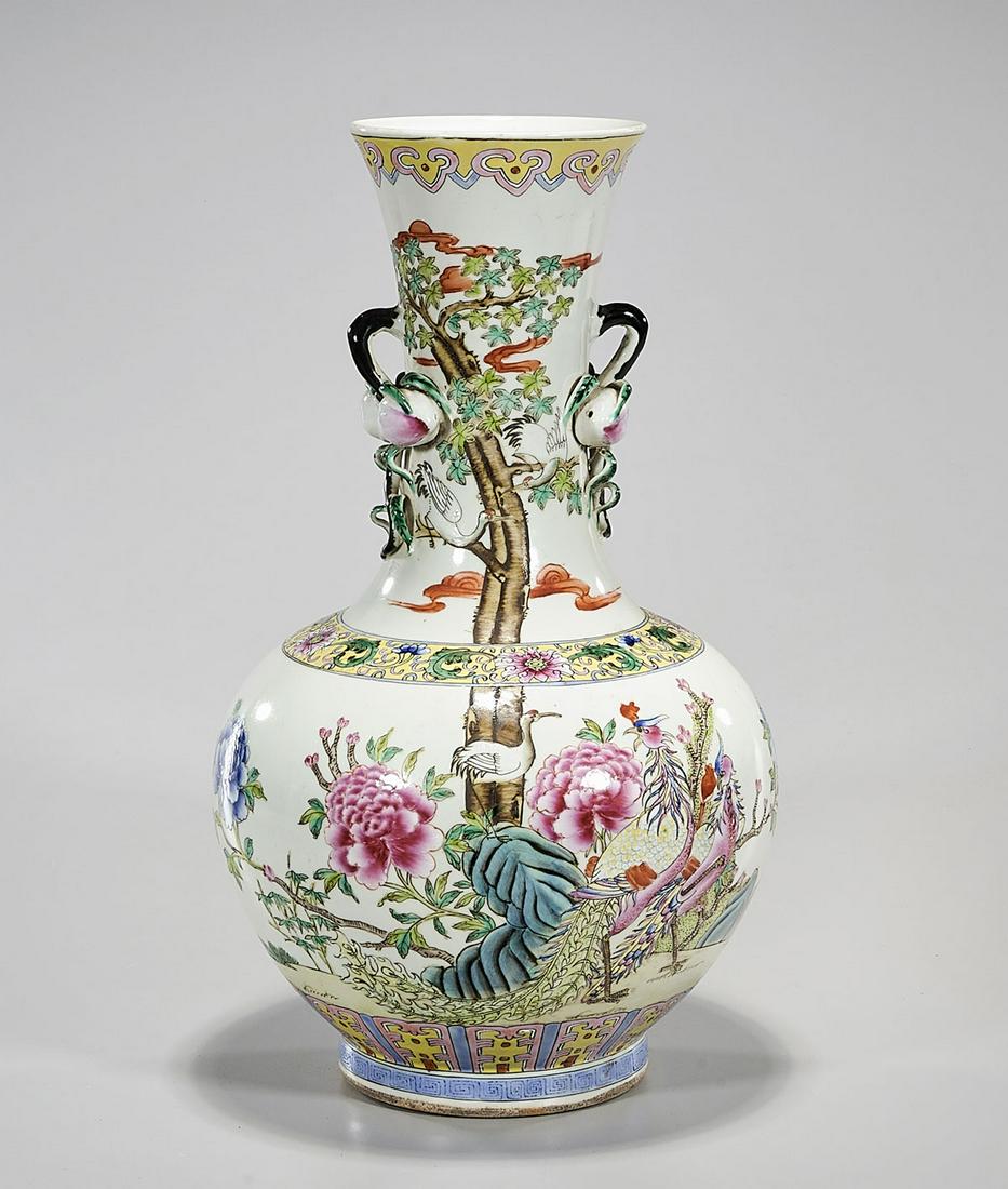 Chinese Enameled Porcelain Vase: Chinese enameled porcelain vase; tree and flower motif with fruit in relief; 16 1/2" x 9" (approx.) Condition: general wear, frits, pits, minor chips