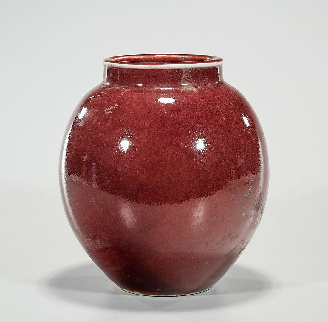 Chinese Oxblood Porcelain Jar: Chinese oxblood porcelain jar; 10" x 9" Condition: cracked; repair; general wear, frits, pits, minor losses