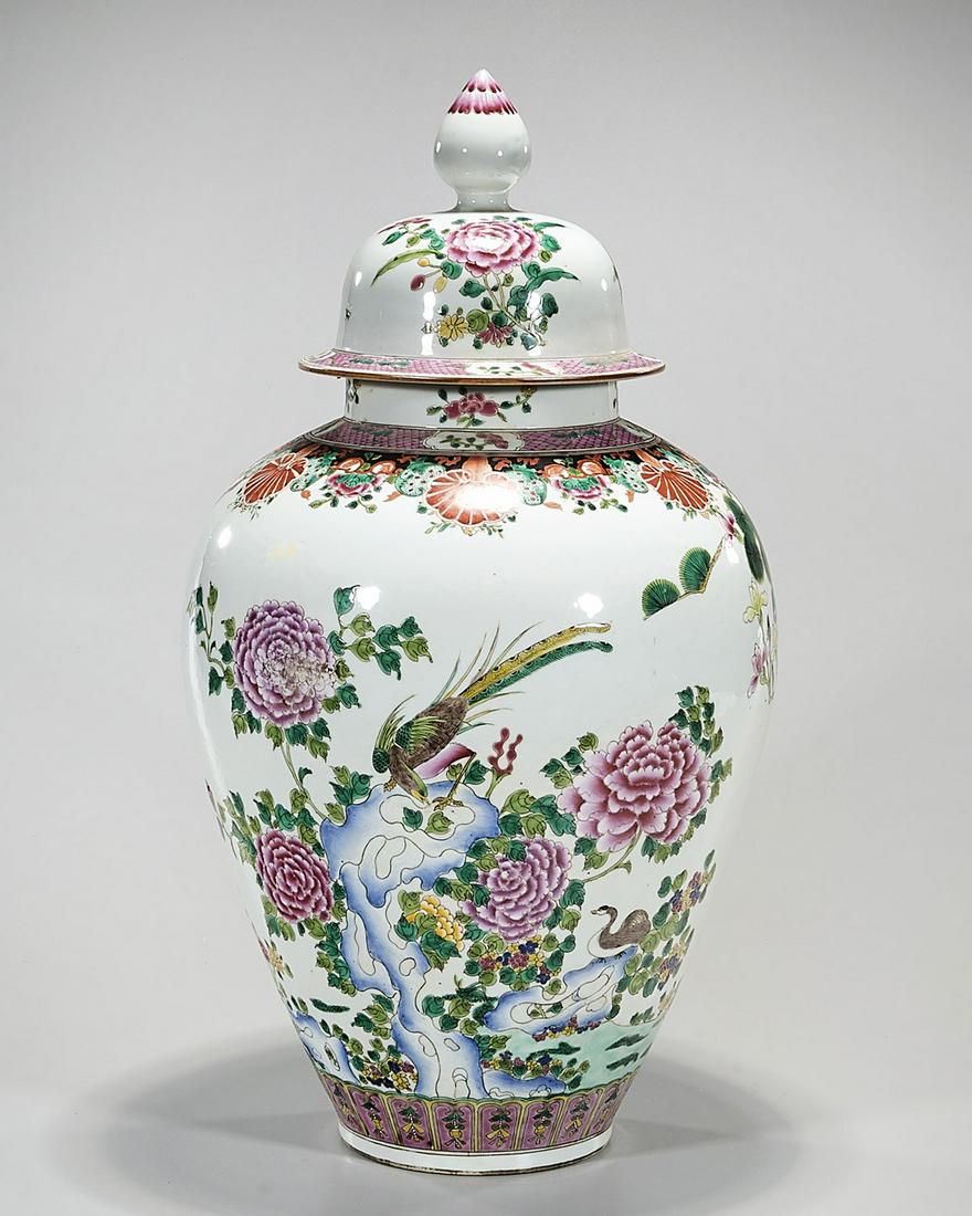 Chinese Enameled Porcelain Covered Jar: Chinese enameled porcelain covered jar; trees and birds motifs; 21" x 11" (approx.) Condition: general wear, frits, pits, minor losses