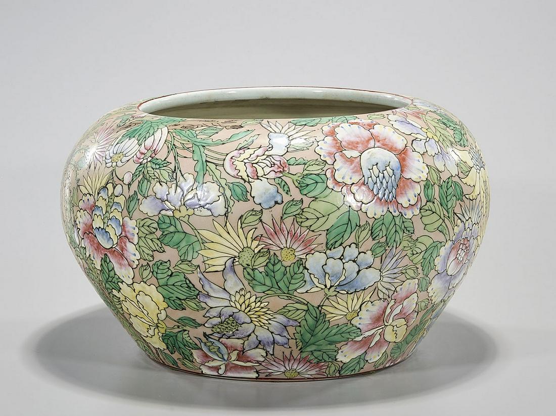 Chinese Enameled Porcelain Jar: Chinese enameled porcelain jar; all-over flower decoration; 9" x 14 1/4" (approx.) Condition: general wear, frits, pits, minor losses