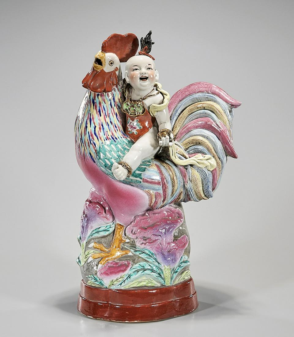 Chinese Enameled Porcelain: Chinese enameled porcelain child riding a rooster; 18" x 10" x 8" (approx.) Condition: general wear, frits, pits, minor losses