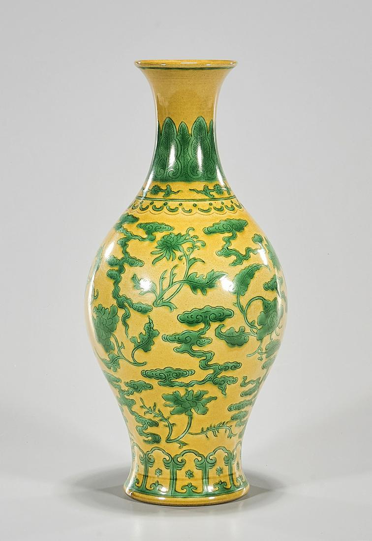 Chinese Enameled Porcelain Vase: Chinese enameled porcelain yellow and green vase; 11" x 6" (approx.) Condition: general wear, frits, pits, minor losses