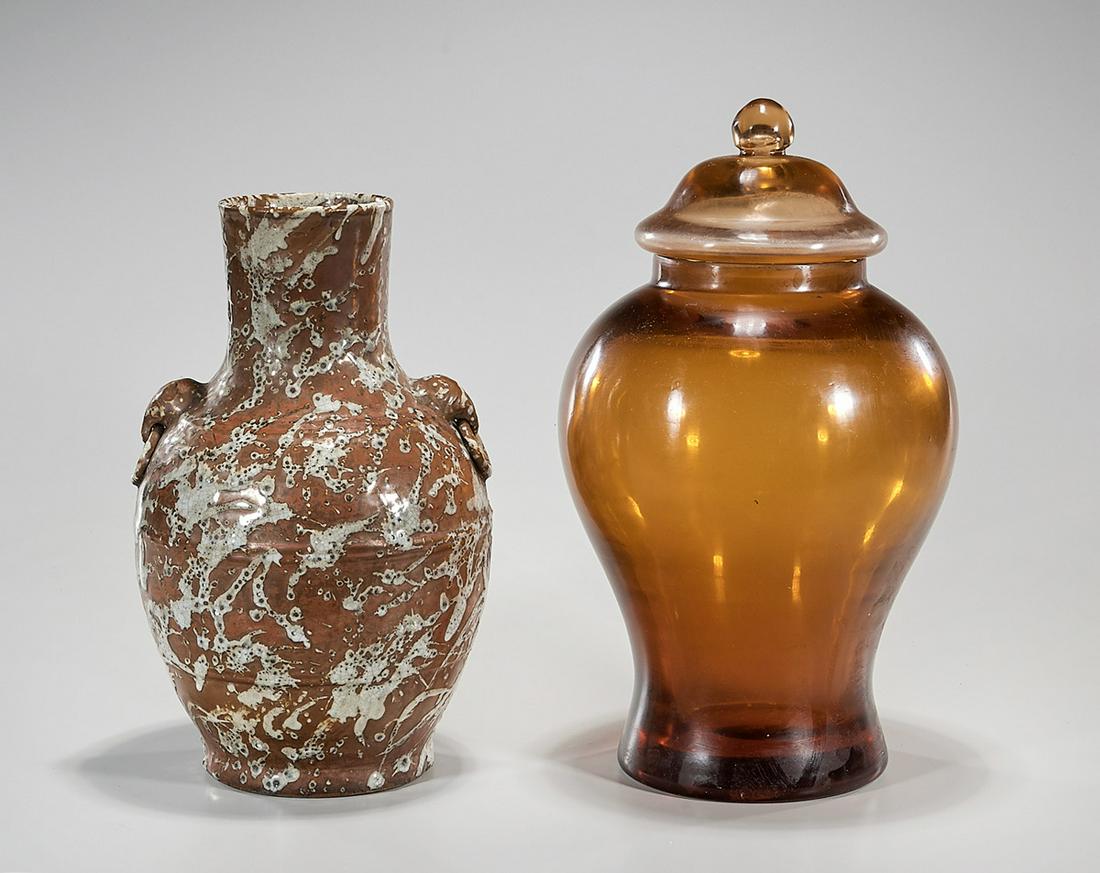 Two Chinese Vases: Two Chinese vases, one covered amber Beijing glass, along with glazed porcelain; 16" x 8" (larger, approx.) Condition: general wear, frits, pits, minor losses
