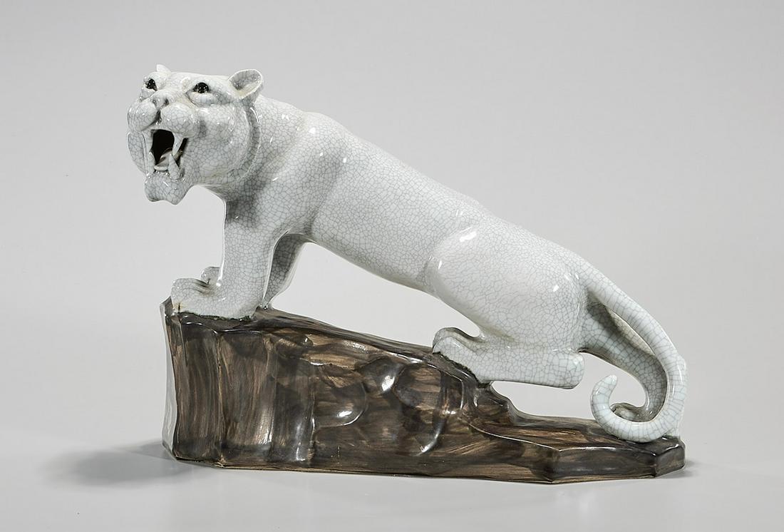 Chinese Crackle Glazed Porcelain Lion: Chinese crackle glazed porcelain lion; 11" x 15" x 7" (approx.) Condition: general wear, frits, pits, minor losses