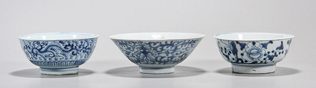 Three Antique Chinese Blue and White Bowls: Three antique Chinese blue and white porcelain bowls; 2 3/4" x 7 1/4" (approx.) Condition: general wear, frits, pits, minor losses