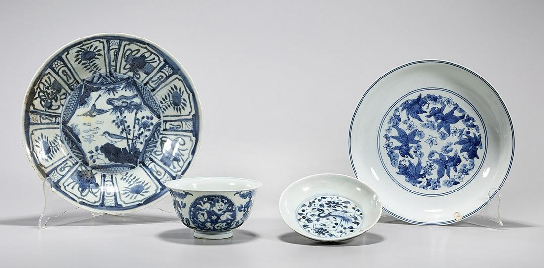 Group of Four Chinese Blue and White Porcelains: Four Chinese blue and white porcelains, including bowl, saucer and two plates; D: 10" (larger, approx.) Condition: general wear, frits, pits, chips, minor losses