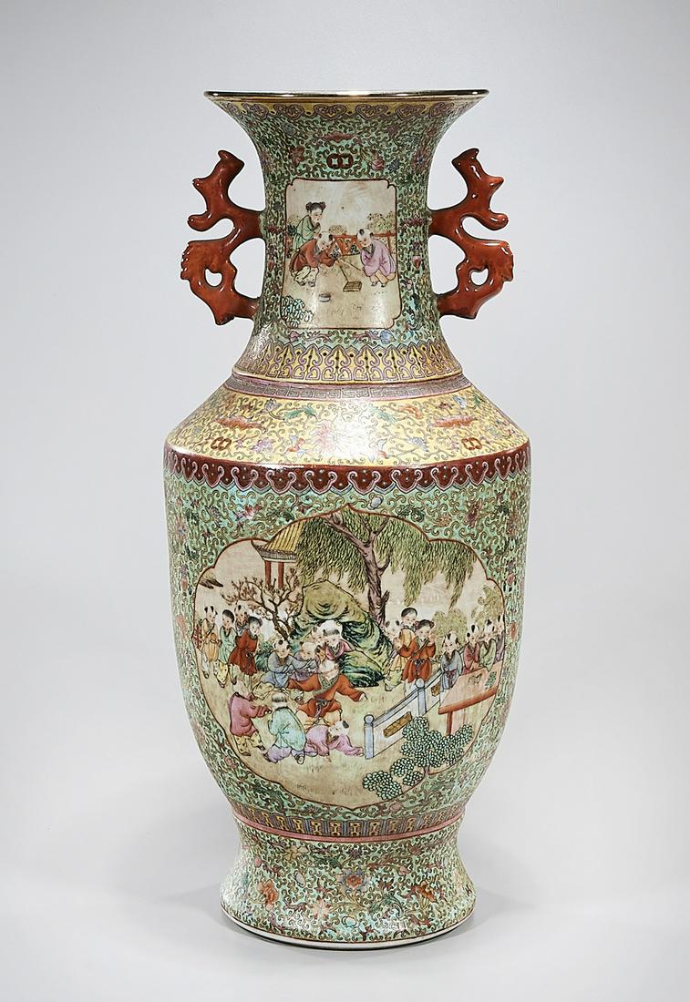 Chinese Enameled Porcelain Vase: Chinese enameled porcelain handled vase; figural motifs; 23" x 10" (approx.) Condition: general wear, frits, pits, minor losses