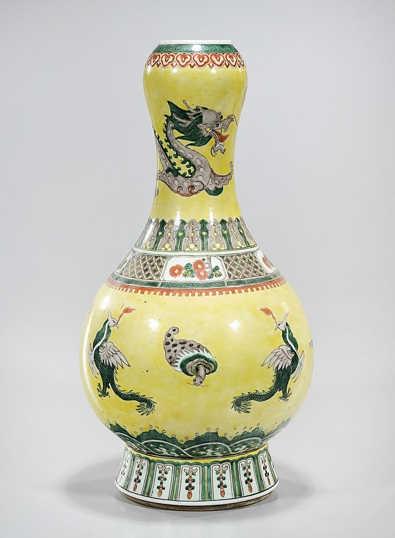 Chinese Enameled Porcelain Garlic Mouth Vase: Chinese enameled porcelain garlic mouth vase depicting a dragon and other creatures; 18" x 9" (approx.) Condition: general wear, frits, pits, minor losses