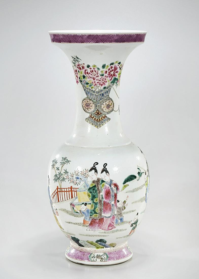 Chinese Enameled Porcelain Vase: Chinese enameled porcelain vase; figures and flowers motifs; 18" x 8" (approx.) Condition: general wear, frits, pits, minor losses