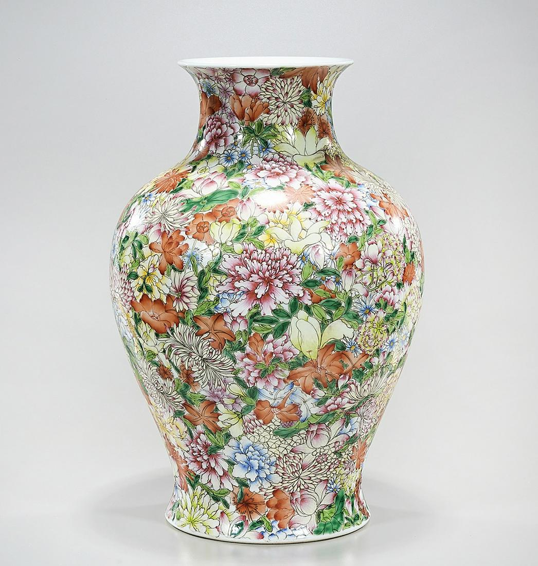 Chinese Enameled Porcelain Vase: Chinese enameled porcelain vase with all-over floral design; 15 1/2" x 8" (approx.) Condition: general wear, frits, pits, minor losses