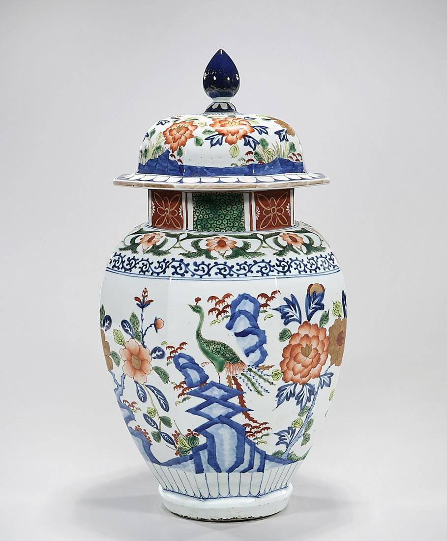 Chinese Enameled Porcelain Covered Vase: Chinese enameled porcelain covered vase with floral design; hallmark to base; 19 1/2" x 12 1/2" (approx.) Condition: general wear, frits, pits, minor losses