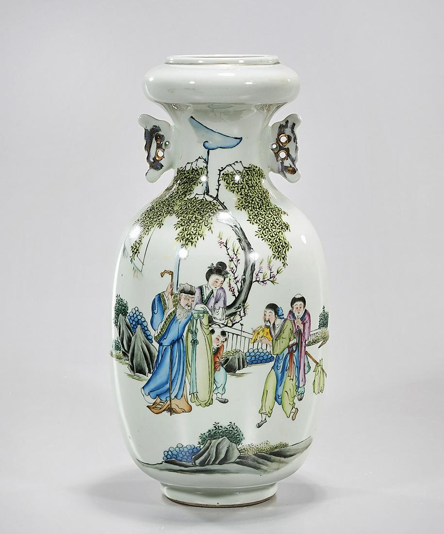 Chinese Enameled Porcelain Vase: Chinese enameled porcelain vase with figural motif; 12" x 6" (approx.) Condition: general wear, frits, pits, minor losses