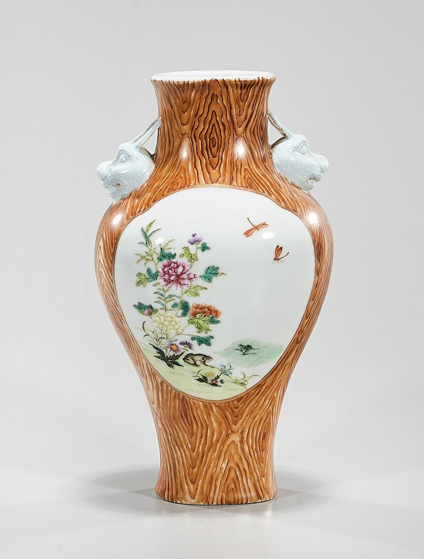 Chinese Enameled Porcelain Vase: Chinese enameled porcelain vase; faux wood with flower design; Qianlong mark to base but later; 8 1/2" x 4 1/2" x 4" (approx.) Condition: general wear, frits, pits, minor losses