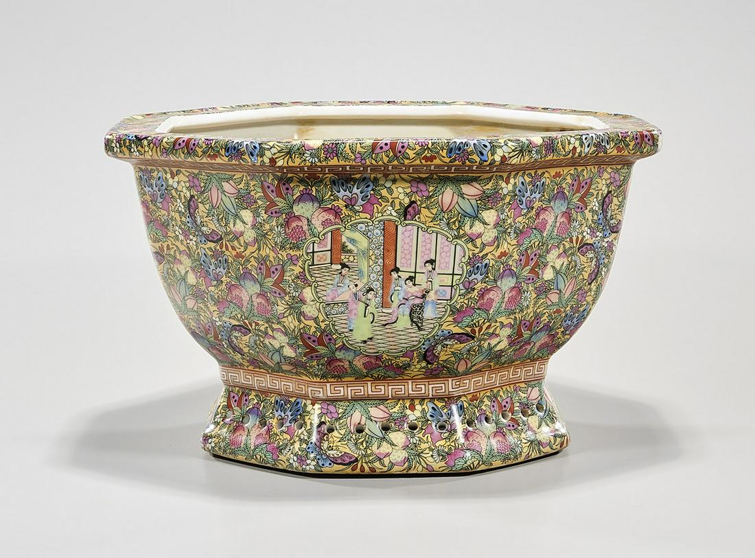 Chinese Enameled Porcelain Jardiniere: Chinese enameled porcelain octagonal jardinere; all-over floral design with central figure design; 8" x 14 1/2" (approx.) Condition: general wear, frits, pits, minor losses