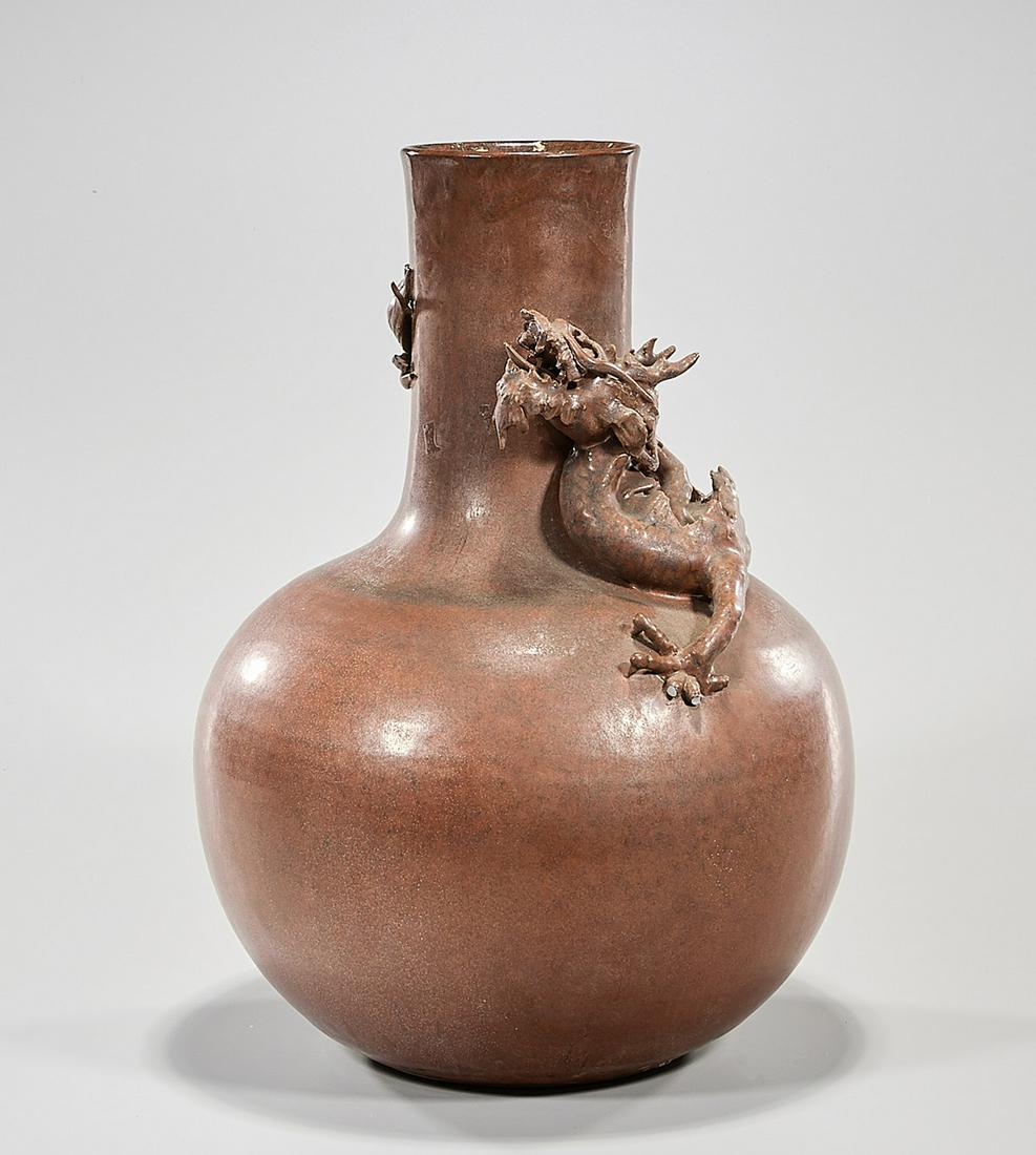 Chinese Glazed Porcelain Vase: Chinese glazed porcelain globular vase with molded dragon to neck and shoulder; 16" x 10 1/2" (approx.) Condition: general wear, frits, pits, minor losses