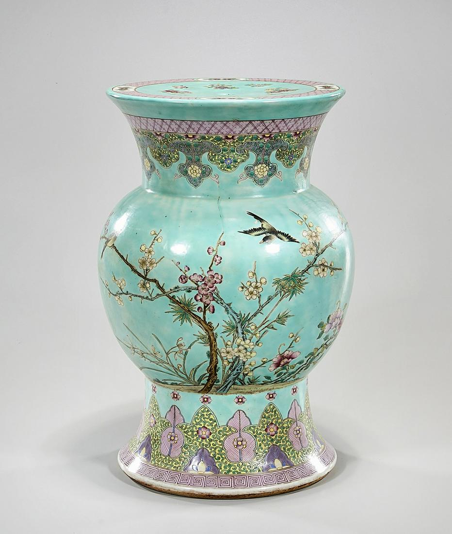 Chinese Enameled Porcelain Gu-Form Garden Seat: Chinese enameled porcelain gu-form garden seat; turquoise ground; blossoming trees with birds Condition: general wear, frits, pits, minor losses