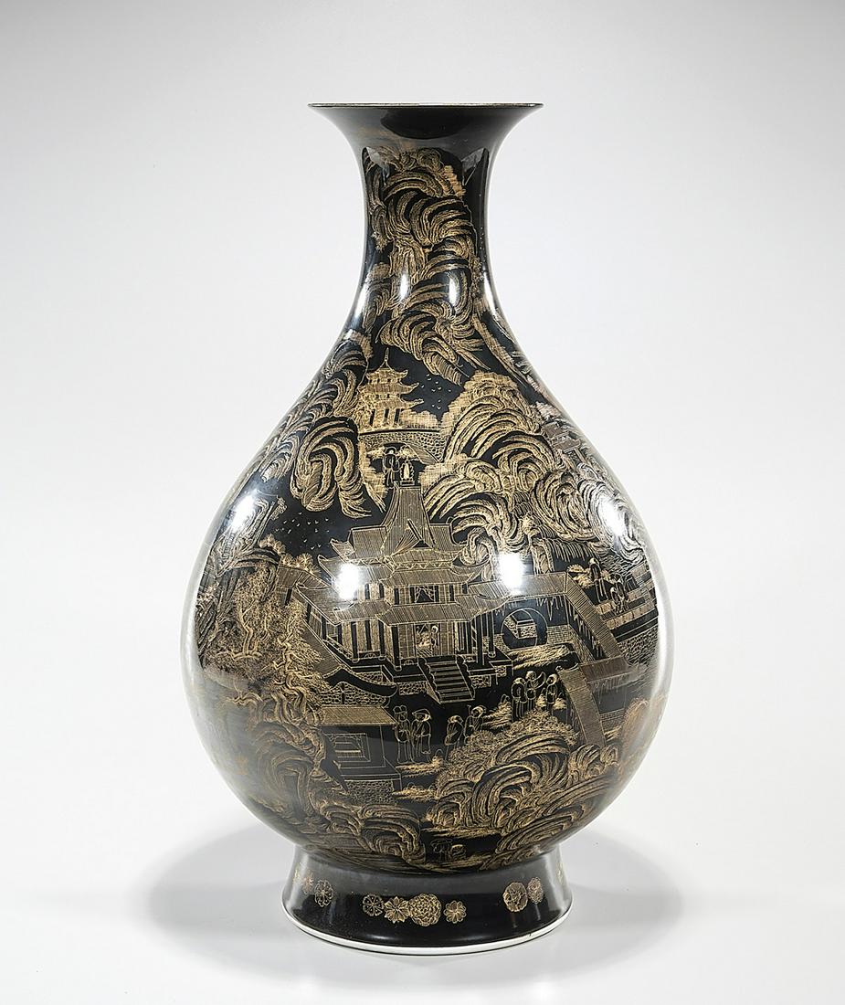 Tall Chinese Black Glazed Porcelain Vase: Tall Chinese black glazed porcelain vase; elaborate gilt design; 22" x 13" (approx.) Condition: general wear, frits, pits, minor losses