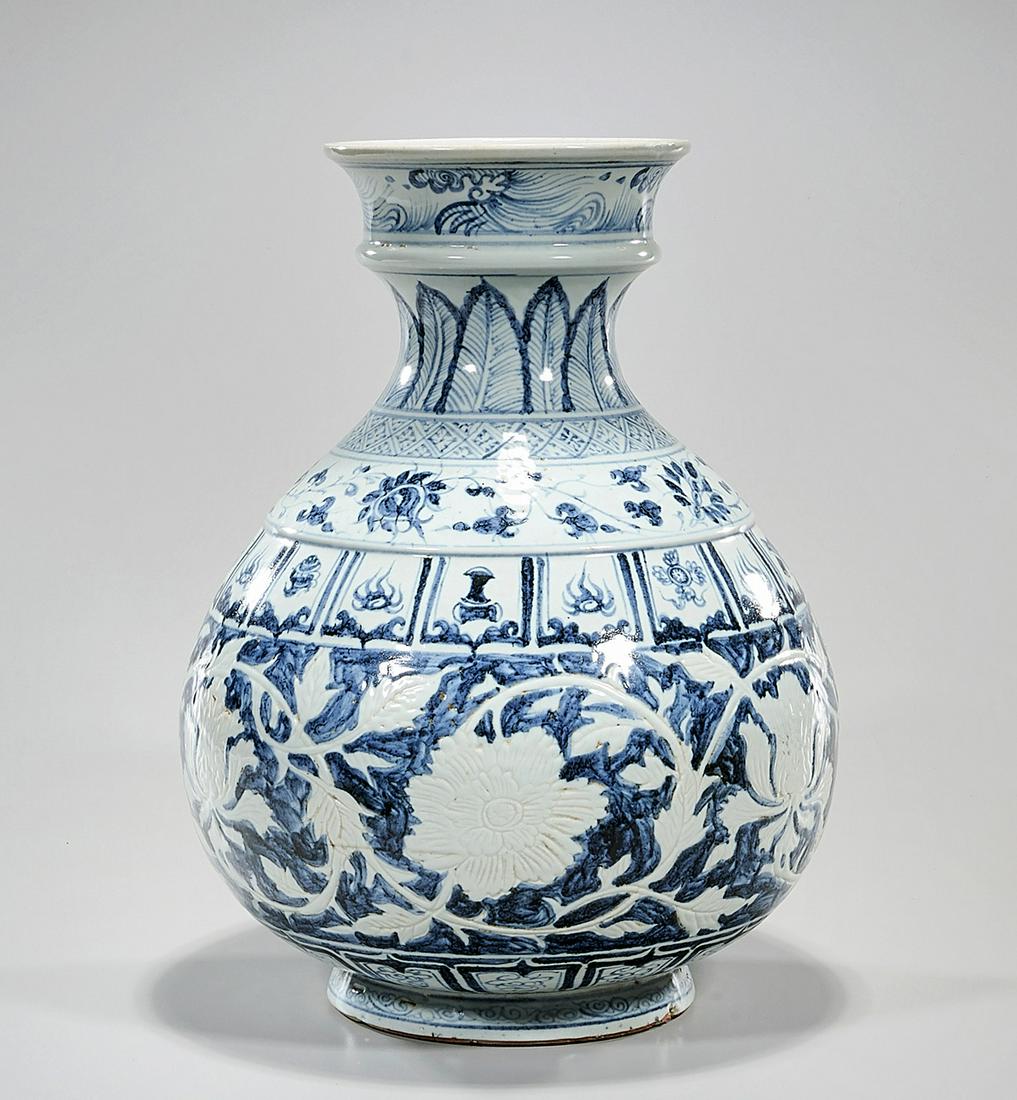 Chinese Blue and White Porcelain Vase: Chinese blue and white porcelain globular vase with scrolling floral design; 16" x 11" (approx.) Condition: general wear, frits, pits, minor losses