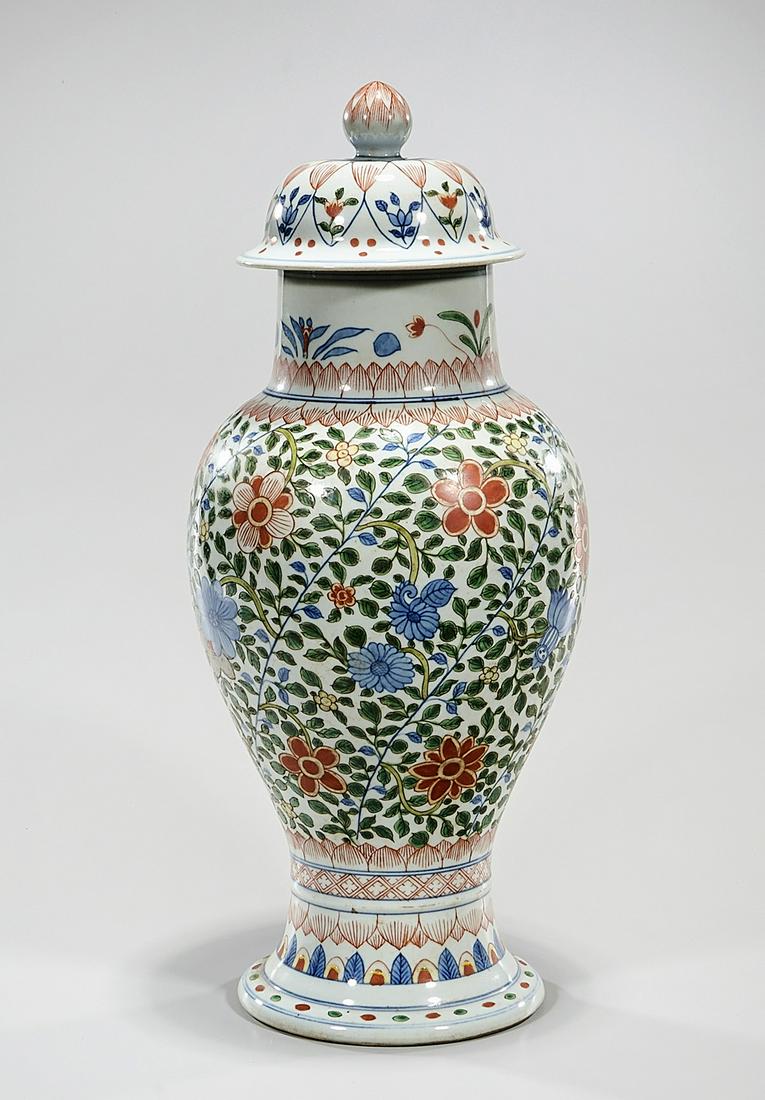 Chinese Enameled Porcelain Covered Vase: Chinese enameled porcelain covered vase with floral design; 19" x 8" (approx.) Condition: general wear, frits, pits, minor losses
