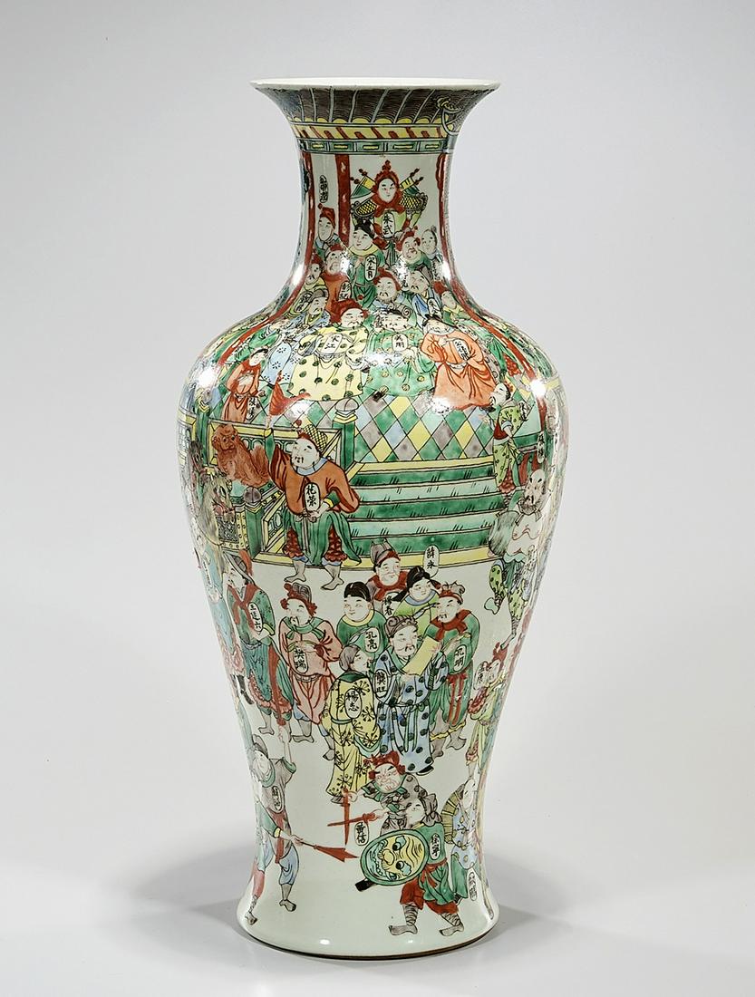 Chinese Enameled Porcelain Vase: Chinese enameled porcelain vase; depicting numerous figures; "All Men are Brothers"; 19" x 8" (approx.) Condition: general wear, frits, pits, minor losses