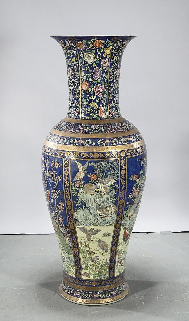 Large Chinese Enameled Porcelain Floor Vase: Large Chinese enameled porcelain floor vase; flowers, birds and trees decoration; 52" x 22" (approx.) Condition: general wear, frits, pits, minor losses